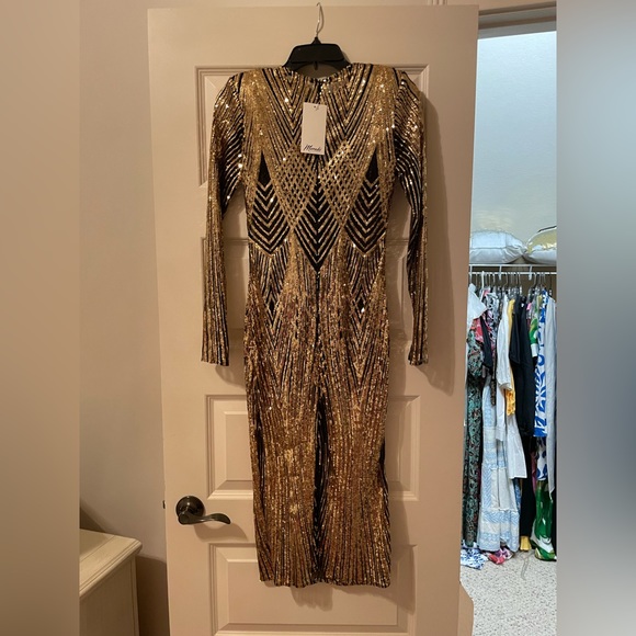 Size AU 12 (US 8). Dress is full of sequins but is sheer.  Meraki brand from AU - Picture 5 of 5